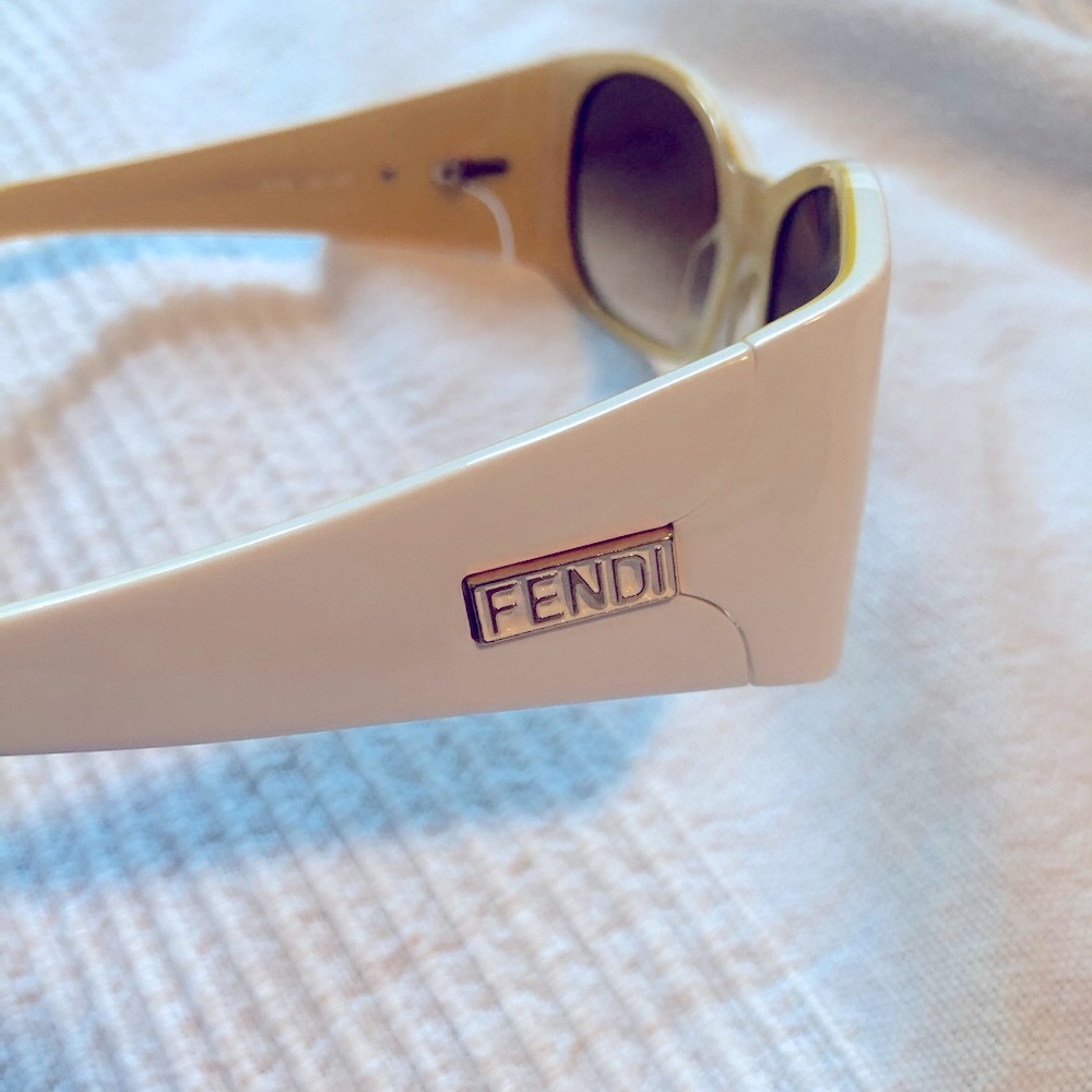 Vintage Fendi fs 307 105 120 sunglasses white with yellow inside.